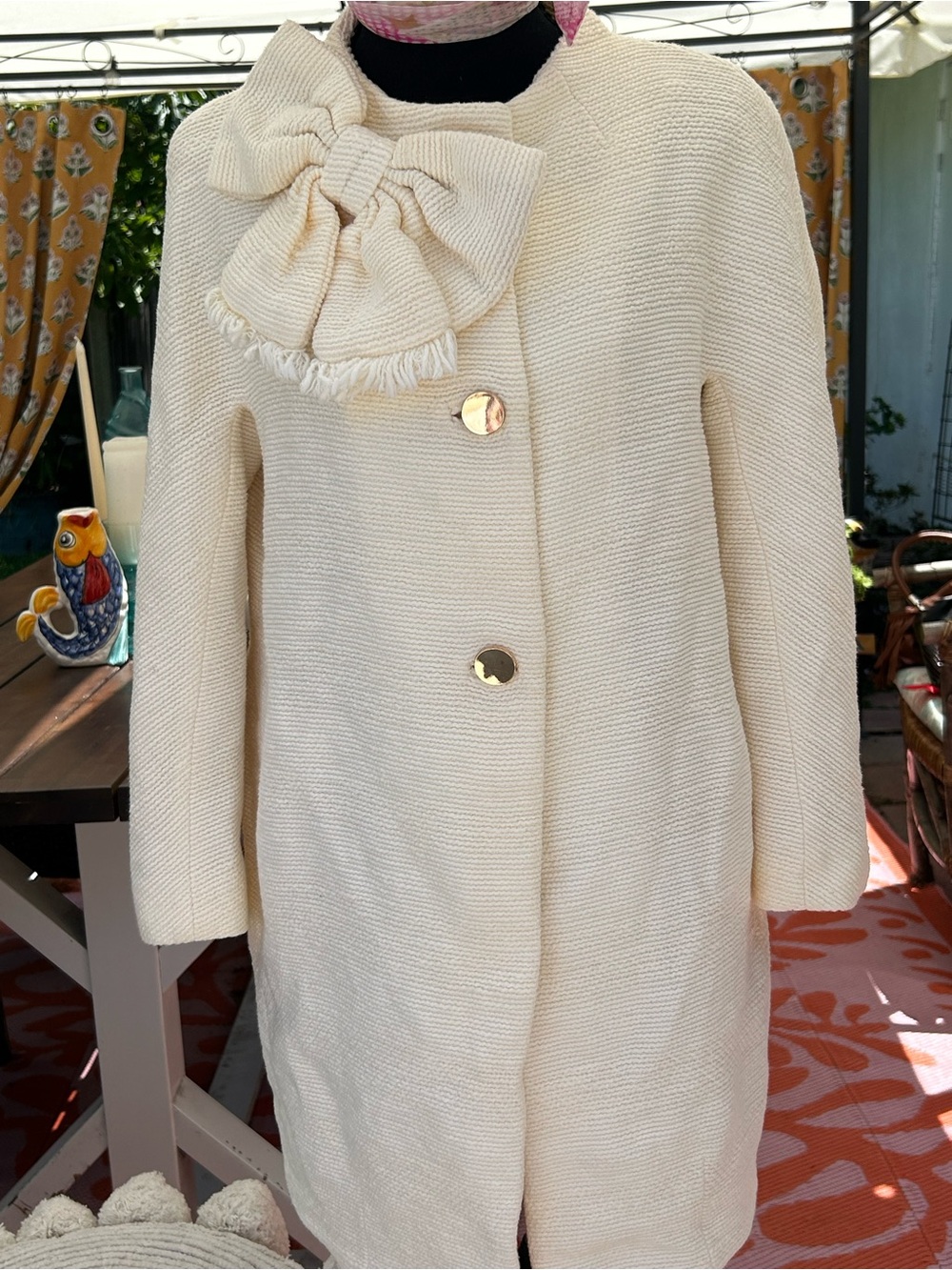 Kate Spade Dorothy tweed cream coat with bow embellishment and pink lining